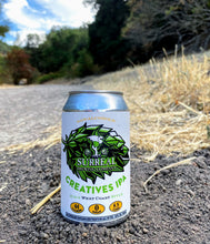 Load image into Gallery viewer, Can of Surreal Non-alcoholic Creatives West Coast IPA on a trail.
