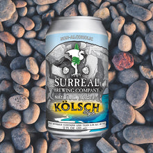 Load image into Gallery viewer, Can of Surreal Non-Alcoholic Kolsch Style. 17 Calories, Zero Sugar, 2.8 calories. Background stones.
